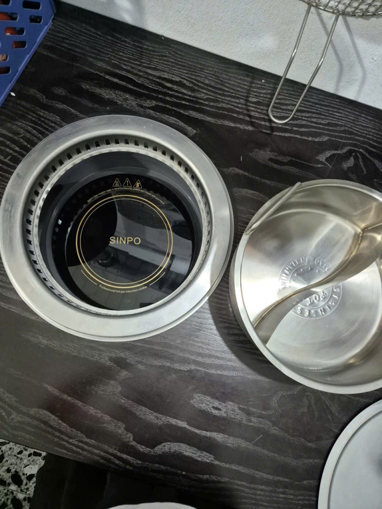 Hình ảnh bếp từ lẩu 2 ngăn tròn được sử dụng hiện nay